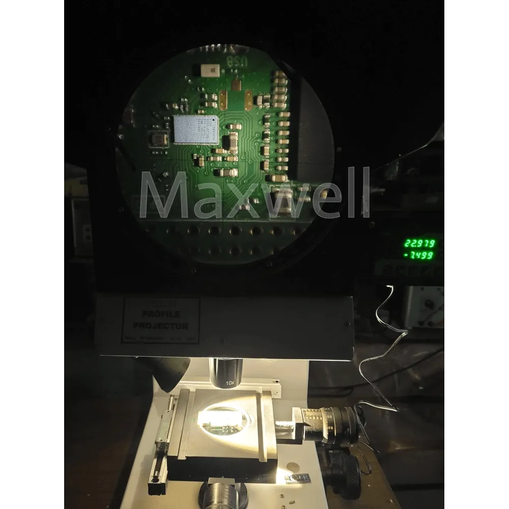 Inspecting electronics circuit using a profile projector with a magnification of 10x